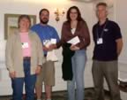 Awards presented for best student papers at the 2005 AES Meeting, left to right: Kenna MacKenzie, President of the AES; Andrew Morrison, runner up; Pauwlina Dexter, first prize; Jon Sweeney, Past-President.  Photo by George Fanjoy. (48kb)